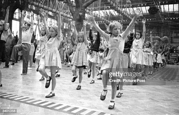 Group of children being entertained by the staff in the Butlin's Camp at the North Yorkshire seaside resort of Filey. Original Publication: Picture...