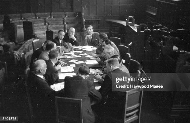Meeting between unions, employers and politicians in Coventry, A F Dick of Standard Motors, Labour MP Richard Crossman, Labour MP Maurice Edelman,...