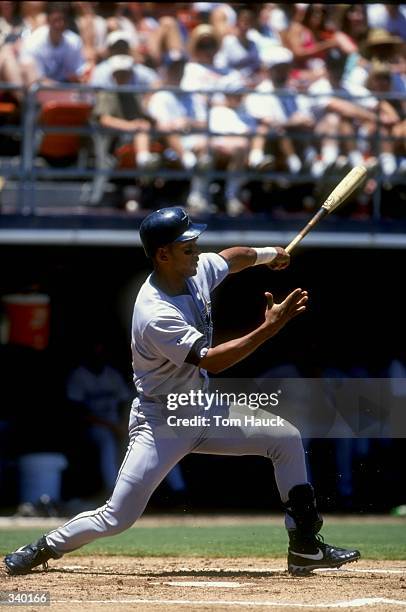 Moises Alou of the Houston Astros swings in the game against the San Diego Padres at Qualcomm Stadium in San Diego,California. The Padres defeated...