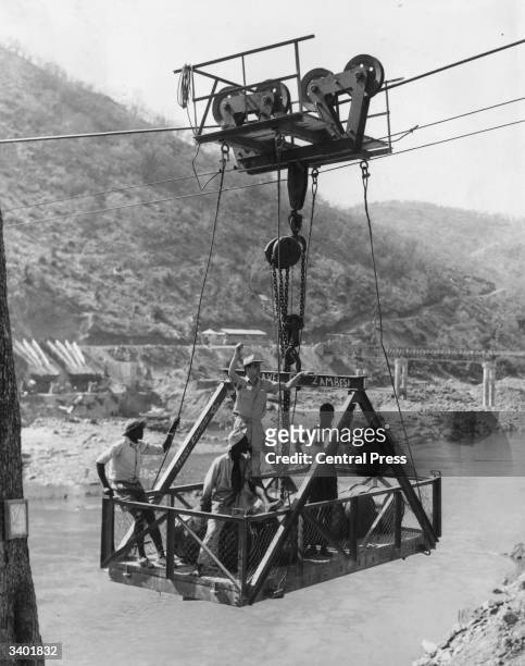 Hoist for carrying vehicles, heavy machinery and workers across the Zambezi River during the construction of the Kariba Dam , a hydroelectric...