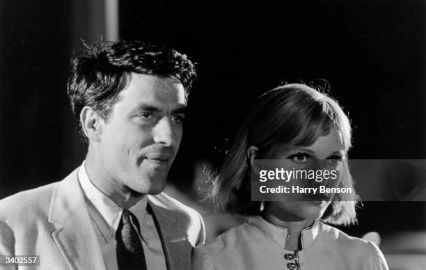 American film actress, Mia Farrow, with film director and actor, John Cassavetes , during the filming of 'Rosemary's Baby', a dark thriller which was...