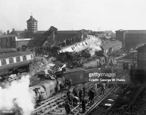 The aftermath of a triple train crash at Harrow and Wealdstone station. It is feared that the death toll could reach over 100 people.