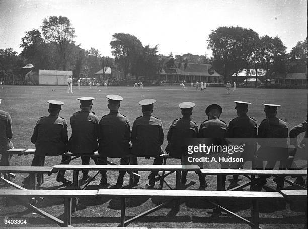 Soldiers watching a match between The Army and the West Indies at the Officer's Club grounds at Aldershot.