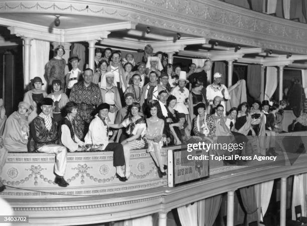 Guests wearing various costumes at the Annual Chelsea Arts Ball in the Albert Hall, London.