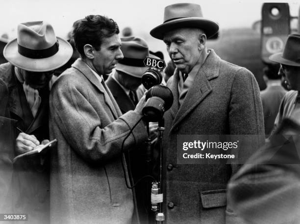 American Secretary of State George C. Marshall being interviewed by a BBC reporter at Northolt after arriving in Britain to represent his country at...