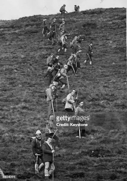 Teams of searchers at Doctor's Gate at Snake Pass, between Manchester and Sheffield, searching for graves after the Moors Murders.