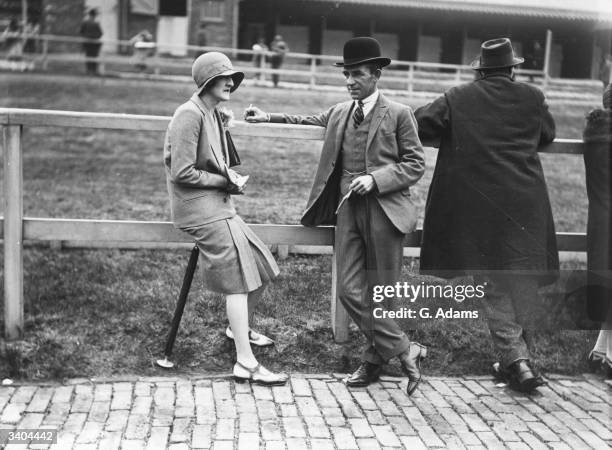 Racegoers at Pontefract Races, Yorkshire.