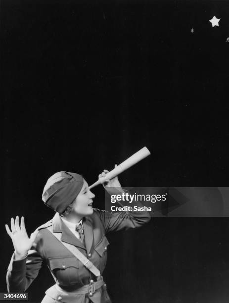 Actress Muriel Angelus appears in 'Sons O' Guns' at the London Hippodrome.