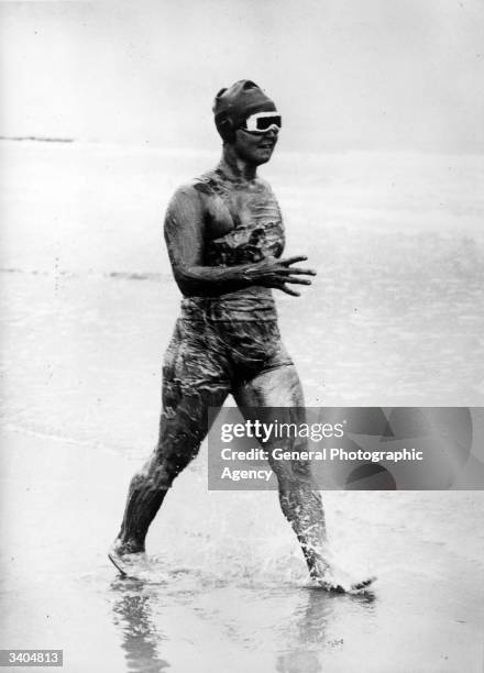 American Olympic gold medalist, swimmer Gertrude Ederle enters the water for her cross-Channel swim.