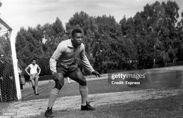 Brazilian World Cup star Pele, said by many to be the greatest footballer of all time, during a training session.