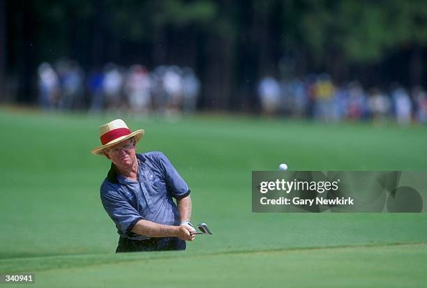 Bob Murphy hits a chip shot during the 1994 U.S. Senior Open at the Pinehurst Golf Course in Pinehurst, North Carolina. Mandatory Credit: Gary...