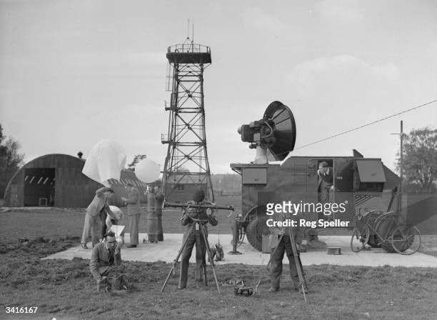 Student officers at the Military College of Science at Shrivenham, release meteorological balloons, fitted with radar targets to allow the students...
