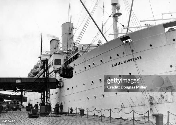 Cargo being loaded onto the British liner 'Empire Windrush'.