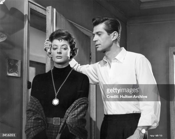 Maggie Smith and George Nader star in the Ealing Studios film 'Nowhere To Go'.