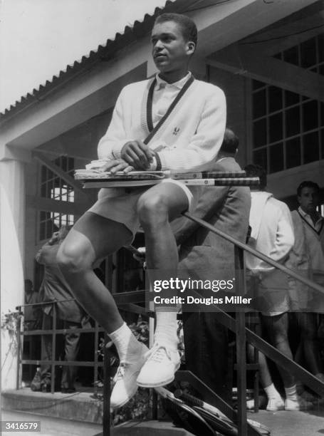 Richard Russell, who represented the West Indies in the Davis Cup, waiting his turn to play in the Wimbledon qualifiers.