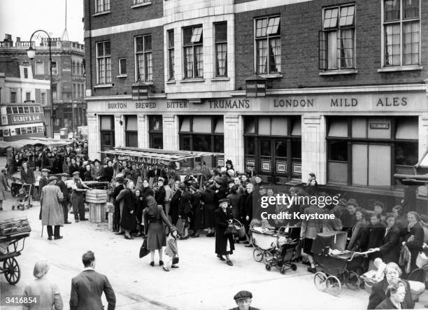 Ww2 Ration Queue Ww2 Rationing Photos and Premium High Res Pictures - Getty Images