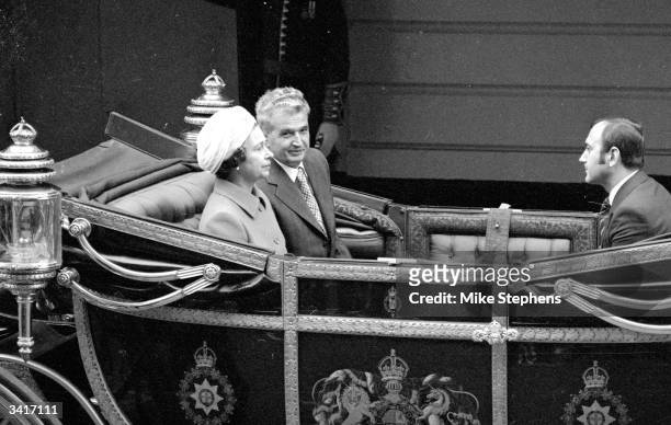 Romanian president Nicolae Ceausescu and Queen Elizabeth II leaving Victoria Station, London for Buckingham Palace, at the start of his four-day...