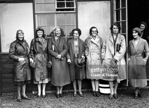 English pioneering aviatrix, Amy Johnson , left, at the opening of the Reading Club.