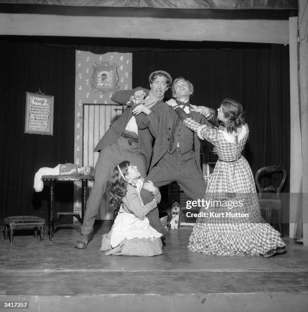 Edward the drunken husband being restrained in a scene from 'The Drunkard' by 'W H Smith and a Gentleman' a nom-de-guerre for American impresario Mr...