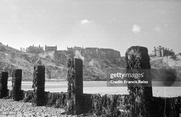 The bay at Overstrand, near Cromer, Norfolk where the sea has advanced a hundred feet in seven years. The buildings on the cliff edge will all soon...