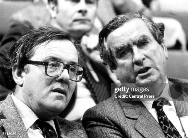 British Labour politician, Denis Healey with former Labour Secretary of State for Northern Ireland Merlyn Rees at a Labour Party conference in...