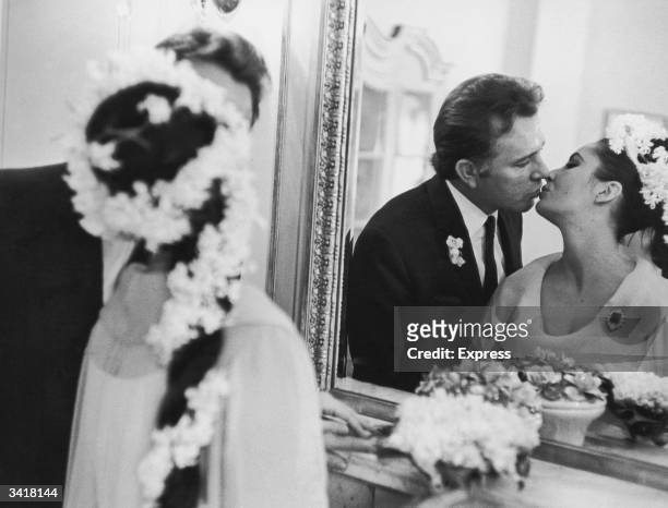 Actress Elizabeth Taylor marries her fifth husband Richard Burton in Montreal.