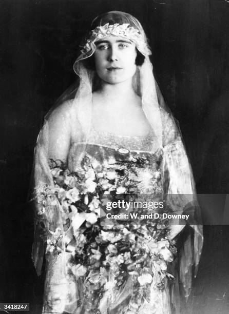 Lady Elizabeth Bowes-Lyon dressed as a bridesmaid to Princess Mary, Countess of Harewood.