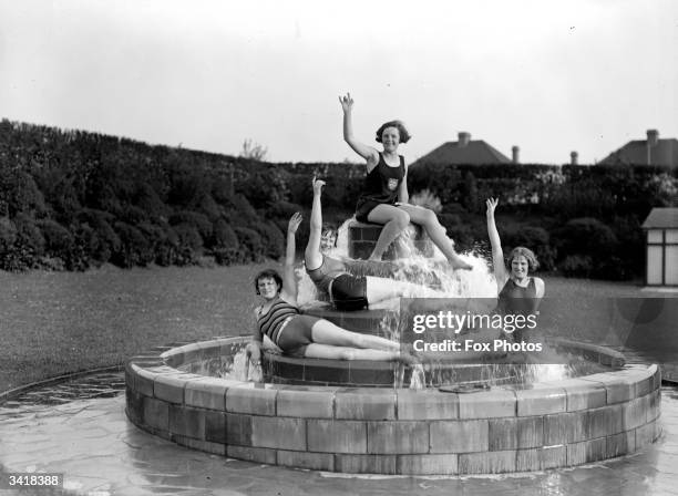 Group of girls in a fountain in Harrow.