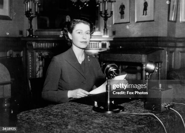 Queen Elizabeth II making her first ever Christmas broadcast to the nation from Sandringham House, Norfolk, 25th December 1952.