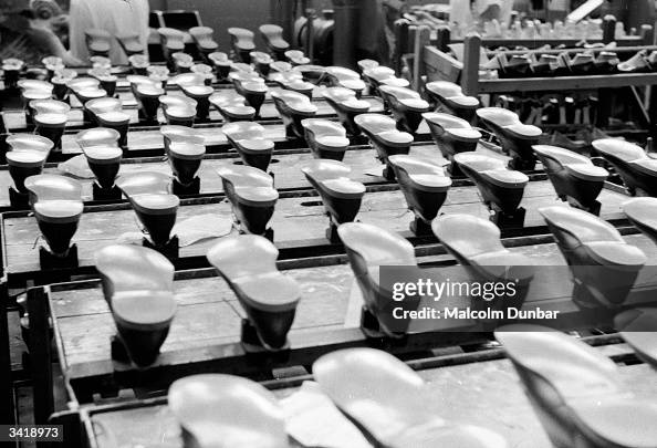 Shoe Rack For Production Process Racks of shoes on the production line at the Gleneagles factory of ...
