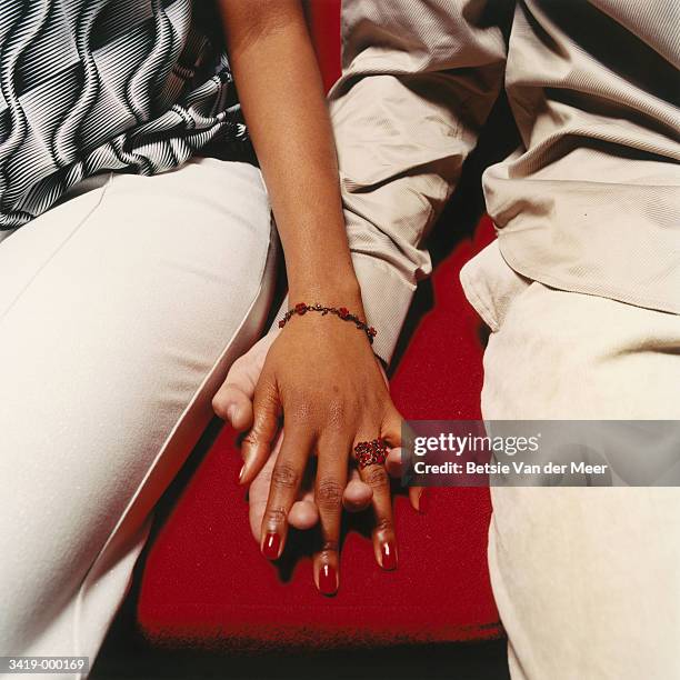 couple holding hands - fingernail foto e immagini stock