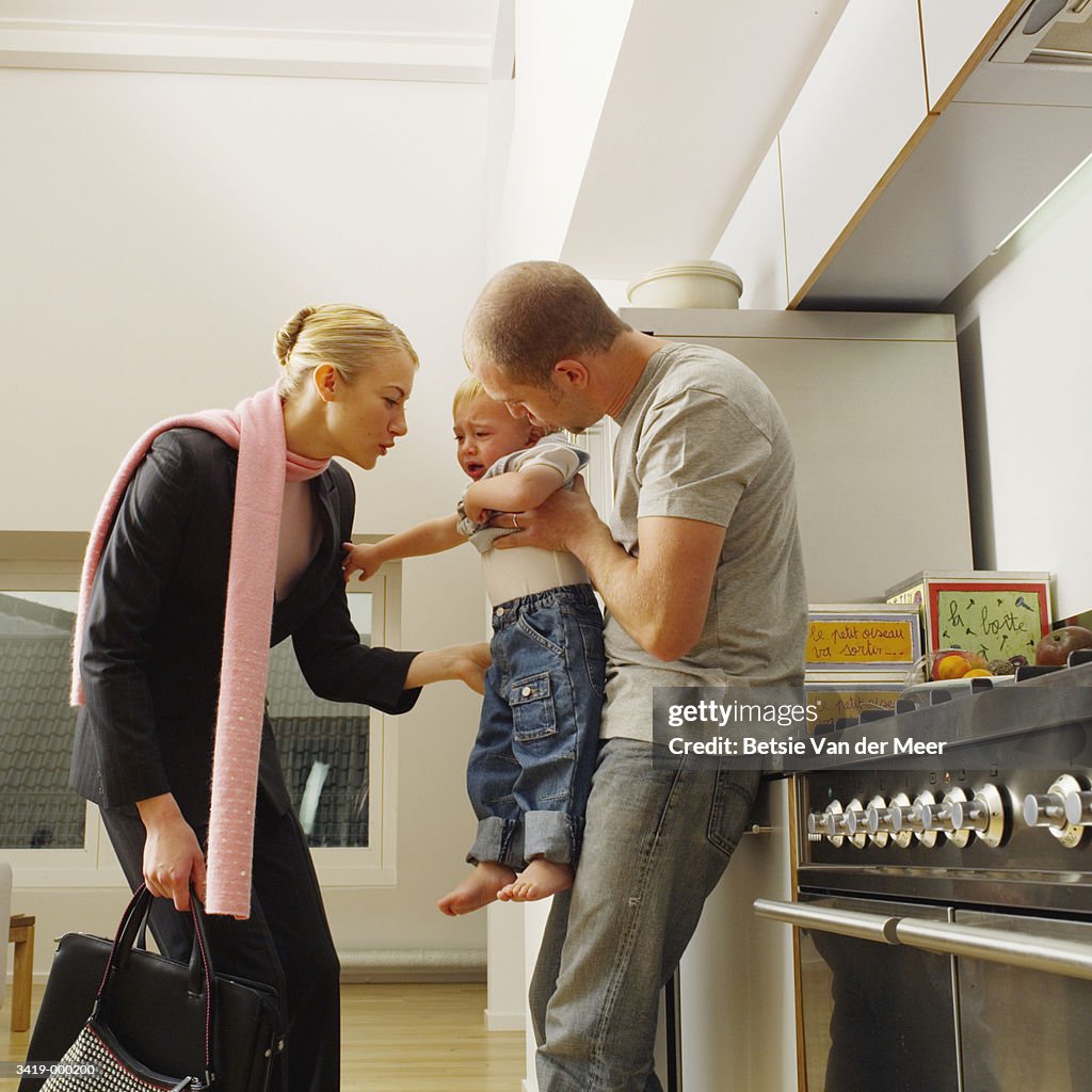 Working Mother Leaving Baby