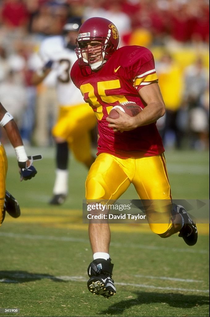 Petros Papadakis of the USC Trojans carries the ball as he runs