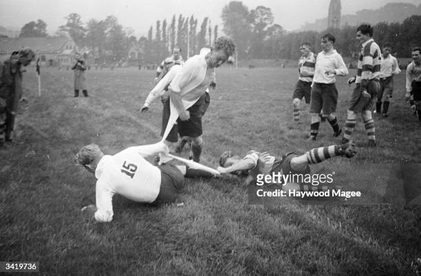 Bath Rugby Football Club v Bridgwater Rugby Football Club. Football shirts being ripped to pieces during the game. Original Publication: Picture Post...