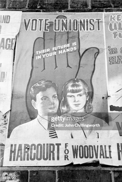 Unionist poster on a wall in Belfast urging people to voate for candidate Harcourt. Original Publication: Picture Post - 7029 - The Best And The...