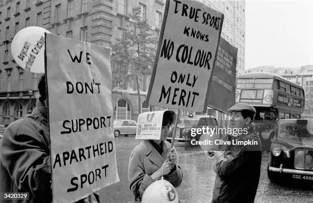 Anti-Apartheid demonstrators outside the Waldorf Hotel in London where South African cricketers are staying.