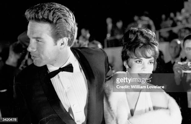 American actor Warren Beatty and actress Natalie Wood at the Oscars award ceremony in Hollywood.