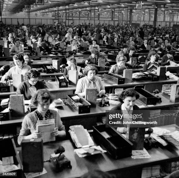 Women at work for a football pools company in Liverpool. Original Publication: Picture Post - 7105 - The Best and Worst of British Cities: Liverpool...