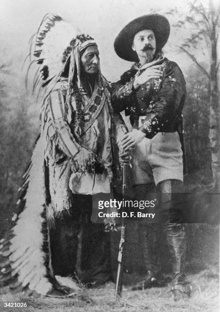 American showman William Frederick Cody, known as Buffalo Bill with Sioux leader Sitting Bull. Cody employed Sitting Bull as one of the main...