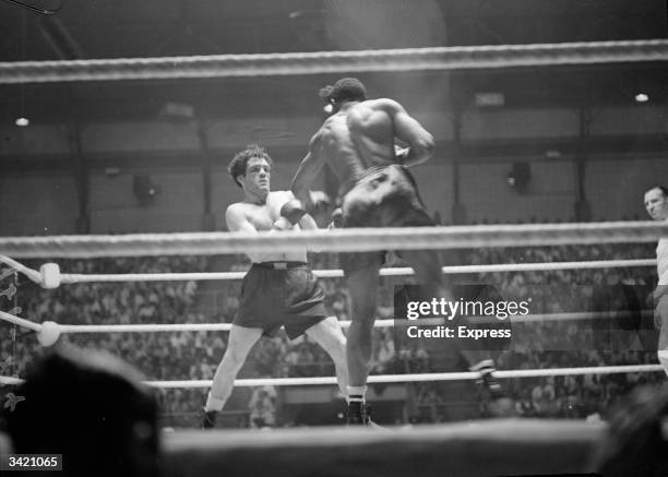 English boxer Freddie Mills during a fight at Haringey in London