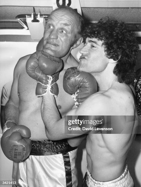 British heavyweight boxer Henry Cooper and footballer Kevin Keegan at a press reception in London where they are promoting the men's aftershave...