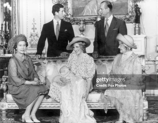 Diana, Princess of Wales holding her son Prince William with Charles, Prince of Wales , Prince Philip the Duke of Edinburgh, Queen Elizabeth II and...