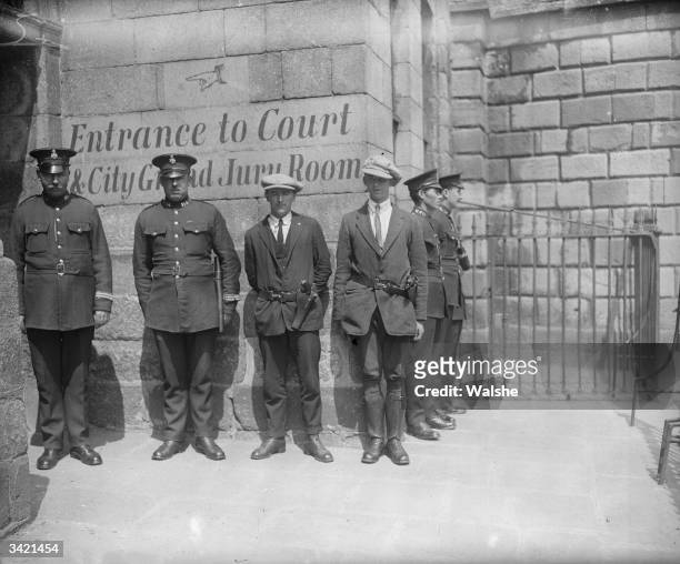 Irish Civic Guards on duty in Dublin during the 1922 elections and just before the outbreak of the Irish Civil War.