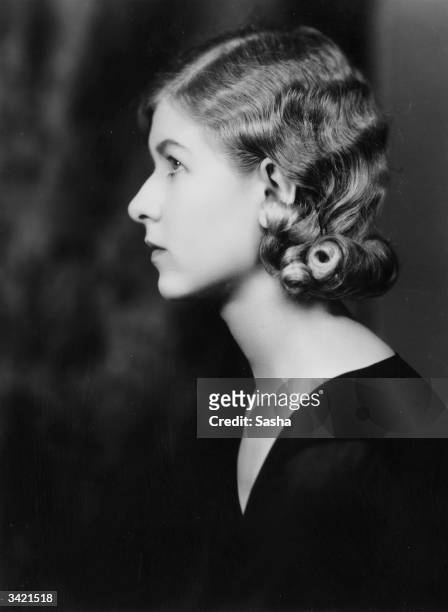 Stark profile shot of British actress Anne Bolt, the leading lady in 'The Toymakers Of Nuremberg', at the Kingsway Theatre, London.
