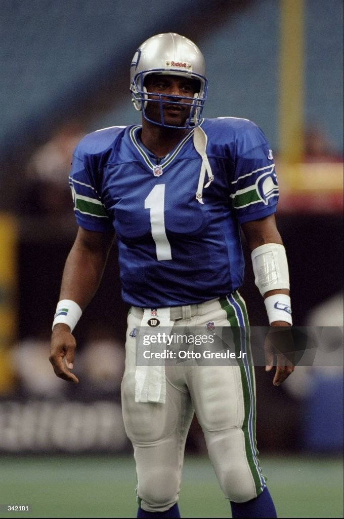 Quarterback Warren Moon of the Seattle Seahawks looks on during the