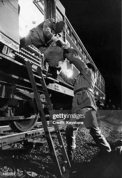 Scene from the film 'Robbery' about a mail train theft being shot on a stretch of disused railway in Leicestershire.