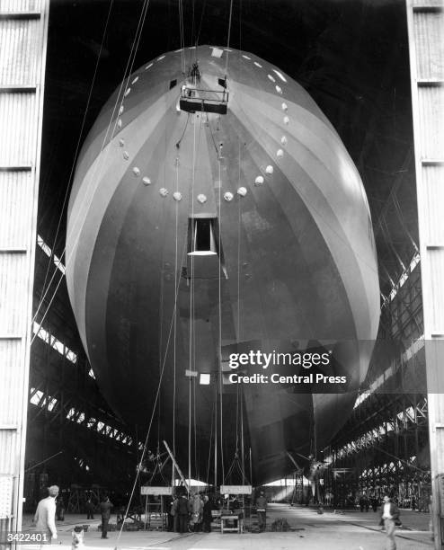 The R101 airship in a hangar at Cardington in Bedfordshire. The R101 was 221 m long and had a gas capacity of 140 million litres . It was powered by...