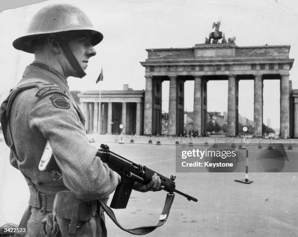 British soldier of the King's Royal Rifle Corps on duty on the border of the Soviet occupied sector, near the Brandenburg Gate in Berlin.