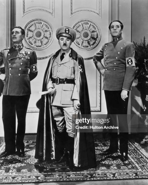 Charlie Chaplin in full regalia as the dictator of Tomania, in the United Artists film 'The Great Dictator', directed by Chaplin himself.