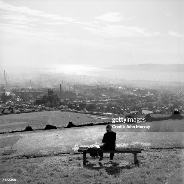 The city of Dundee in Scotland, viewed from the top of a hill. Dundee, situated on the banks of the Silvery Tay, is linked to Fife and the south of...